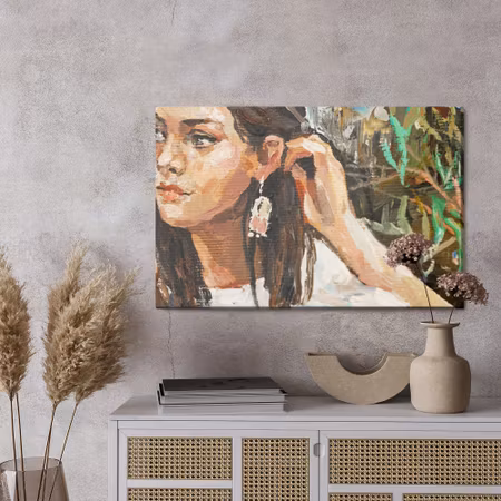 Canvastavla - A young girl is sitting in an ethnic