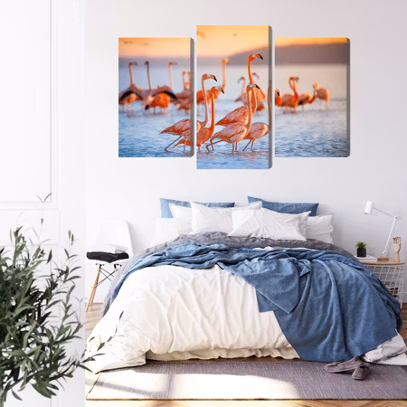 Canvastavla - A flock of flamingos by the water