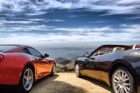 Canvastavla - Luxurious Cars in Front of the