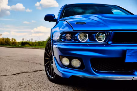 Canvastavla - Multipart Front of a Blue Sports Car