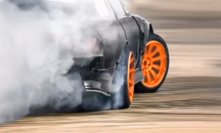 Canvastavla - Multipart Drifting Car in a Puff of