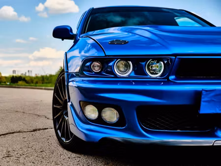 Canvastavla - Multipart Front of a Blue Sports Car