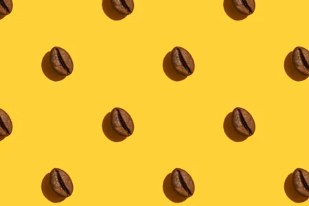 Canvastavla - Coffee Beans on a Yellow Background