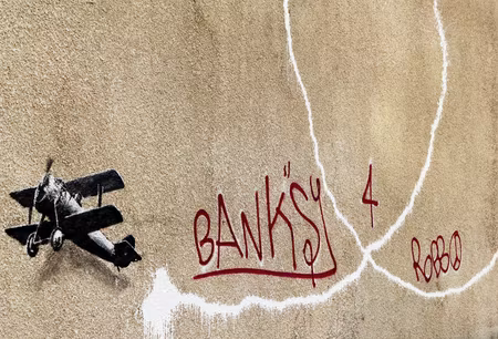 Premium canvastavla - Banksy& s plane - red