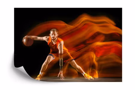 Fototapet - Basketball player in motion