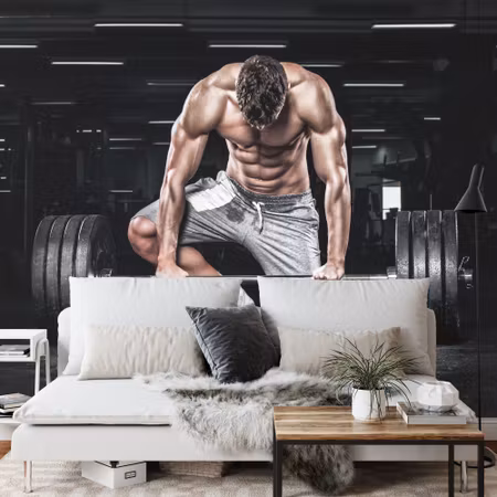 Fototapet - Bodybuilder with a barbell