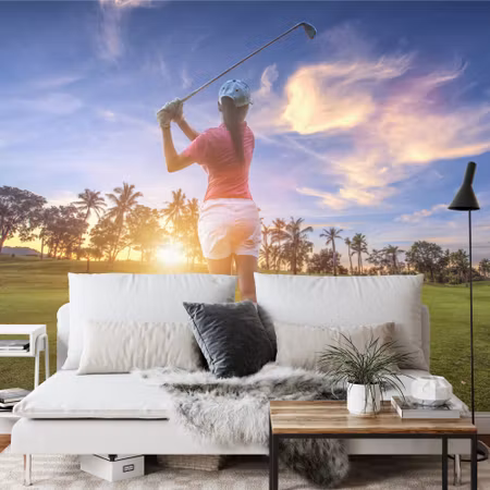 Fototapet - Golfer on the sunset background