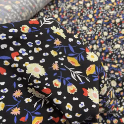 1,3m Viskos - svart botten blommig Marimekkovibb