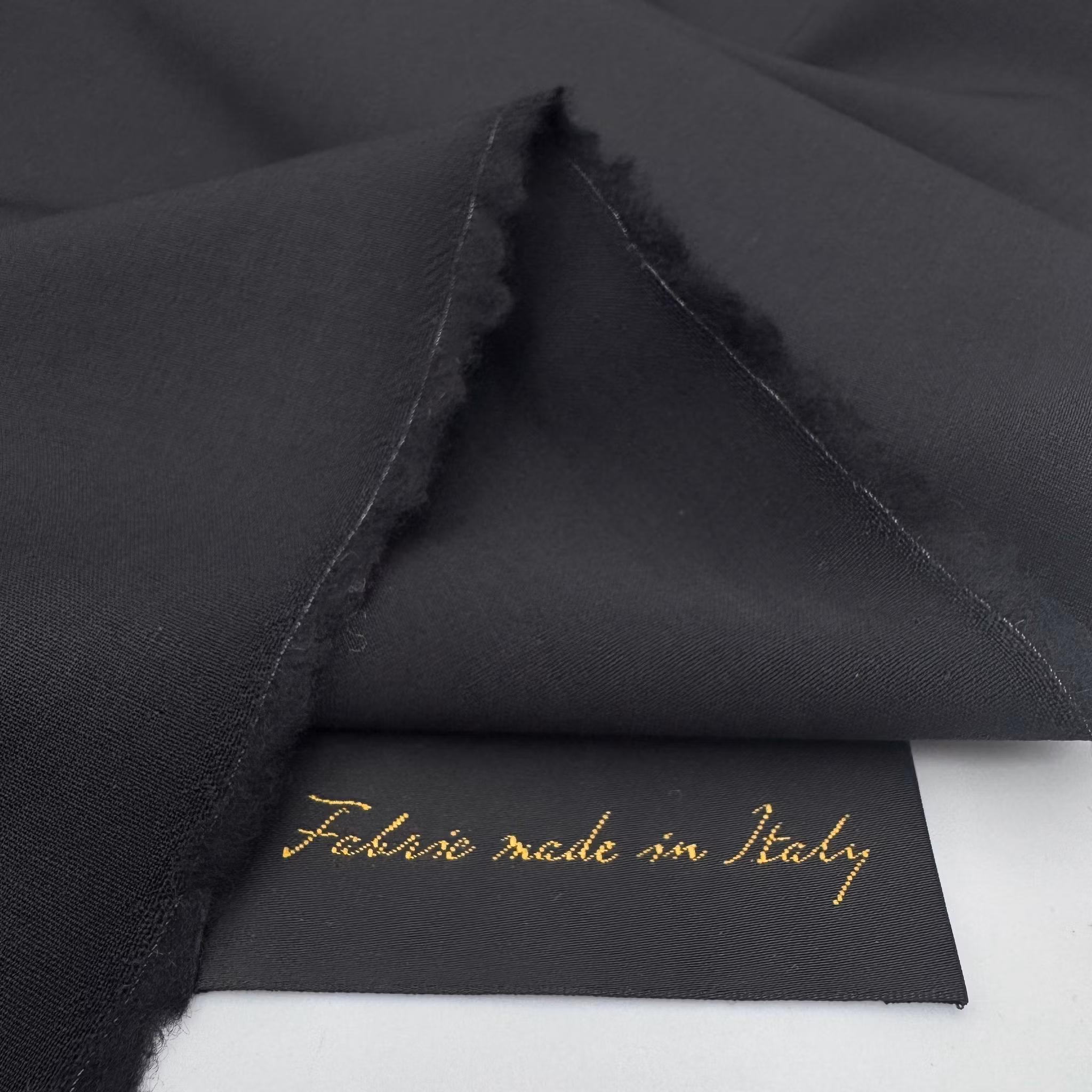 1,5m Ull/elastan svart (lyxull)