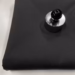 1m Bomull, ripstop, svart. Stuvbit, finns ett svagt märke på biten