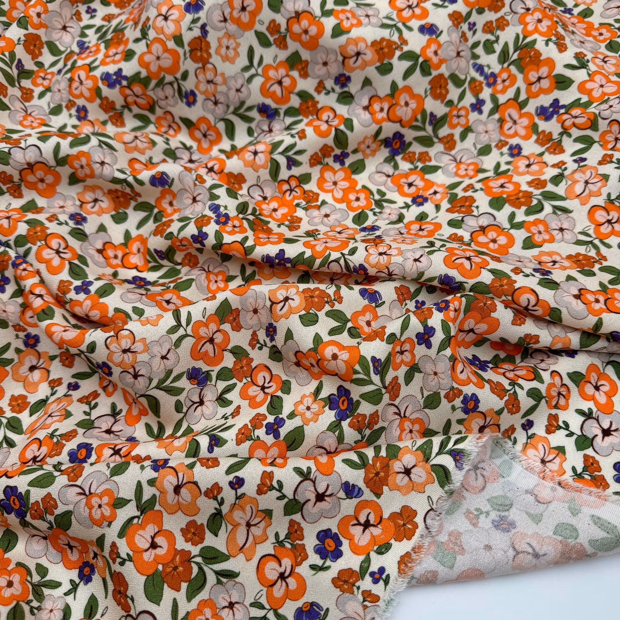 1,5m Viskoscrêpe orange/lila