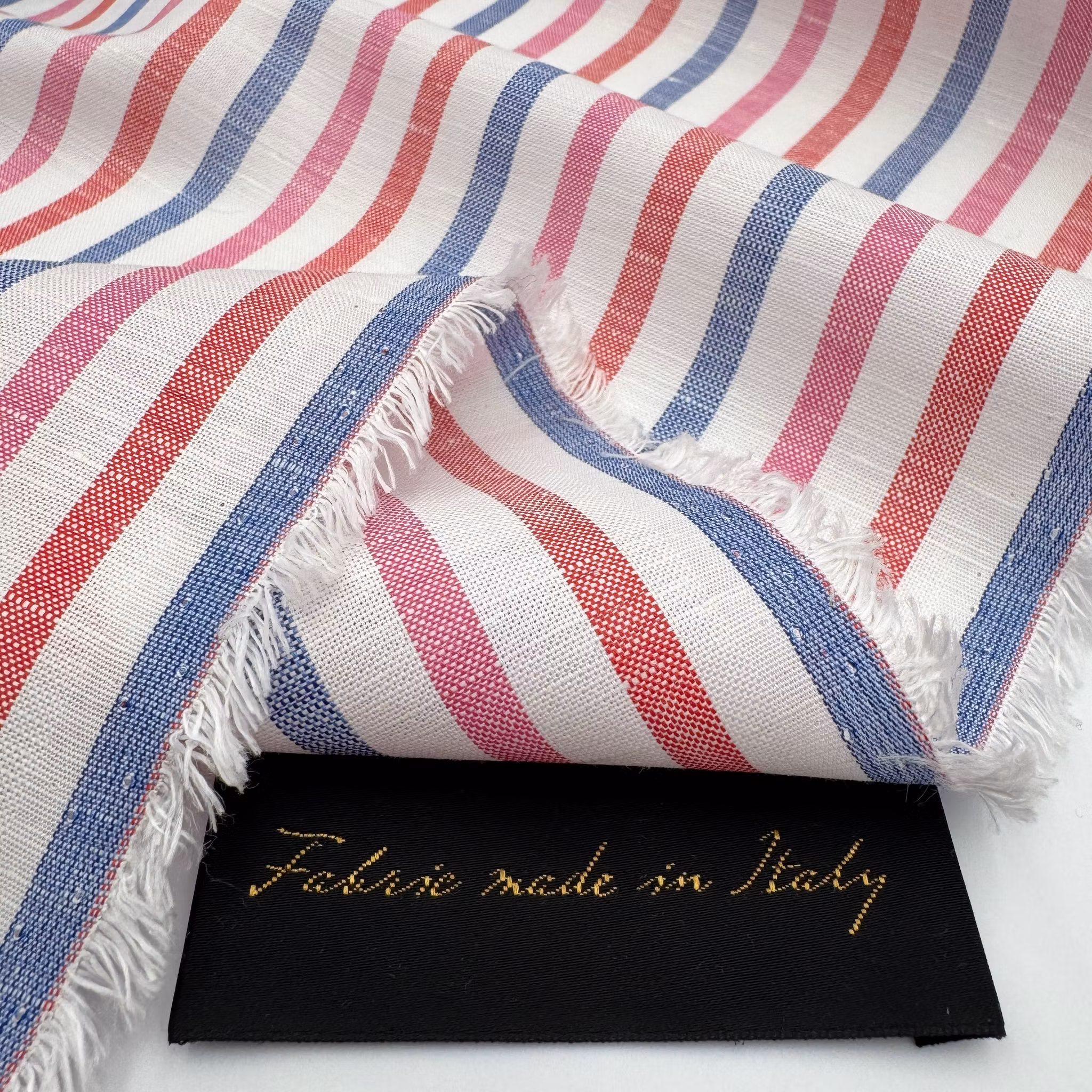 1,35m Lin/bomull rosa/blå/röd rand, lite fläckar