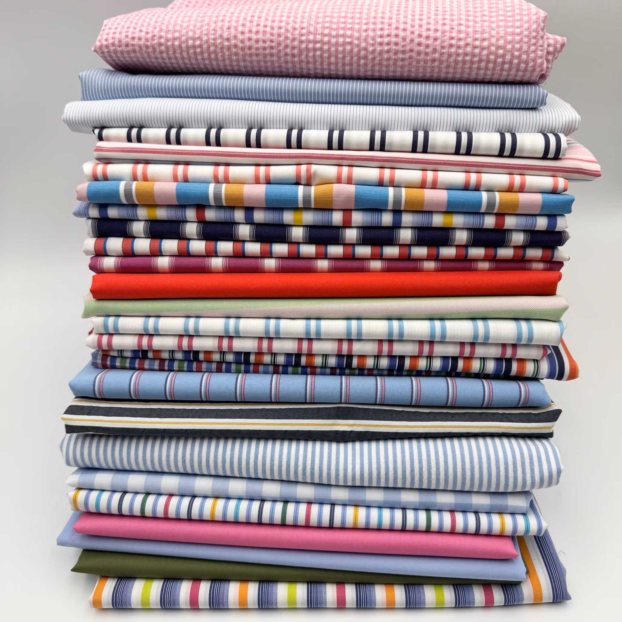 Bomullspoplin vit/lime/orange/cerise rand