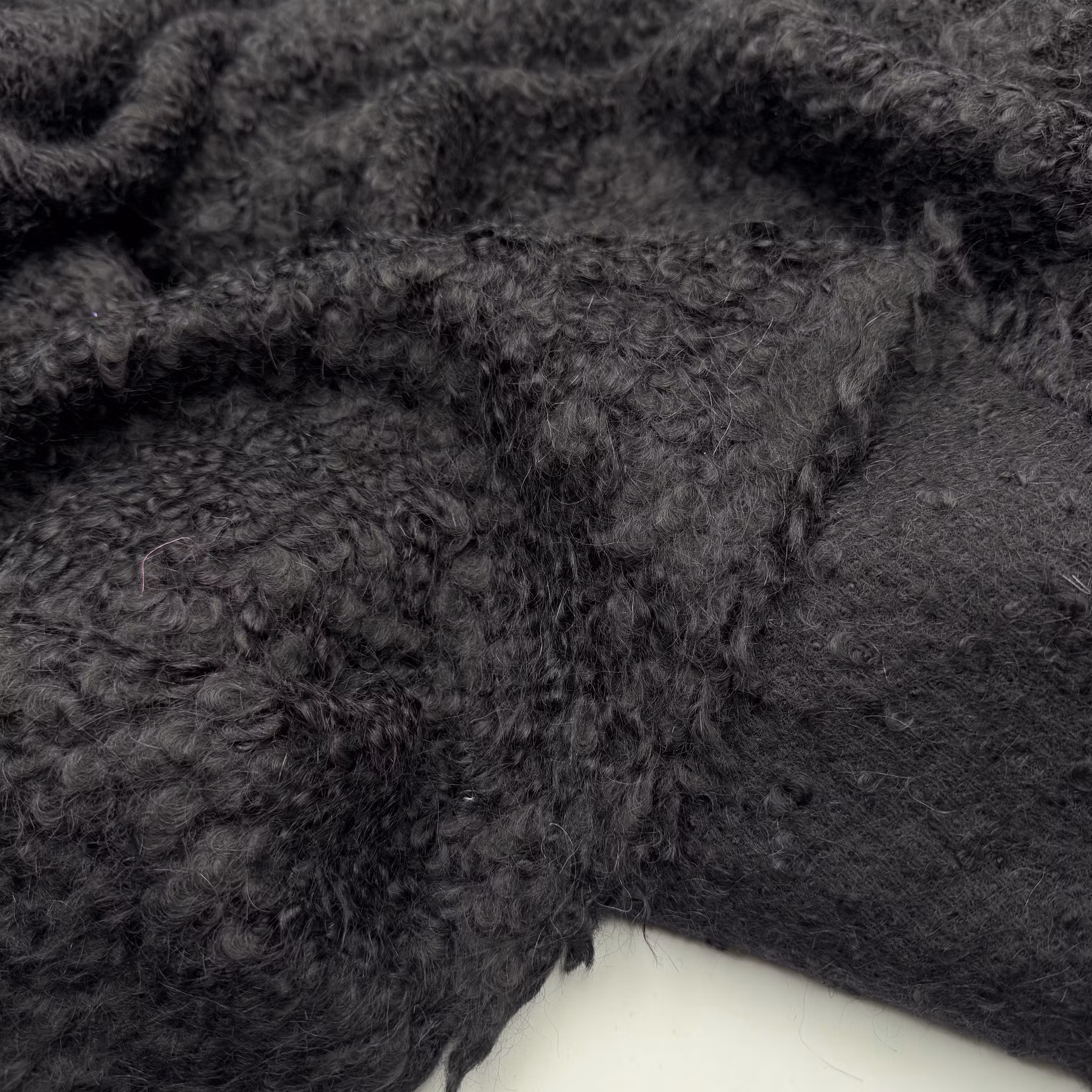 2,5m ull/alpacka svart bouclé
