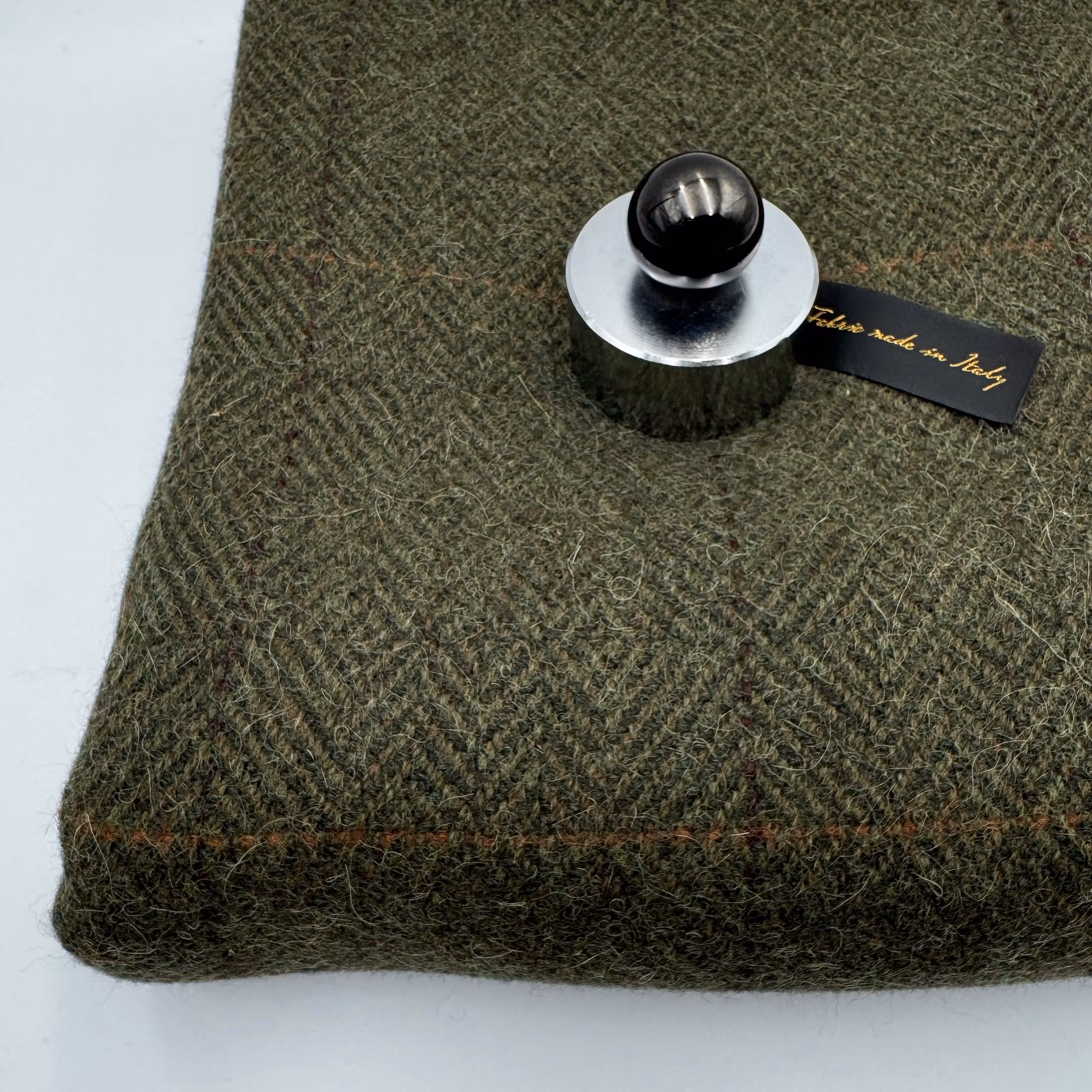 Fluffig tweed mörkgrön gåsöga Hermè*