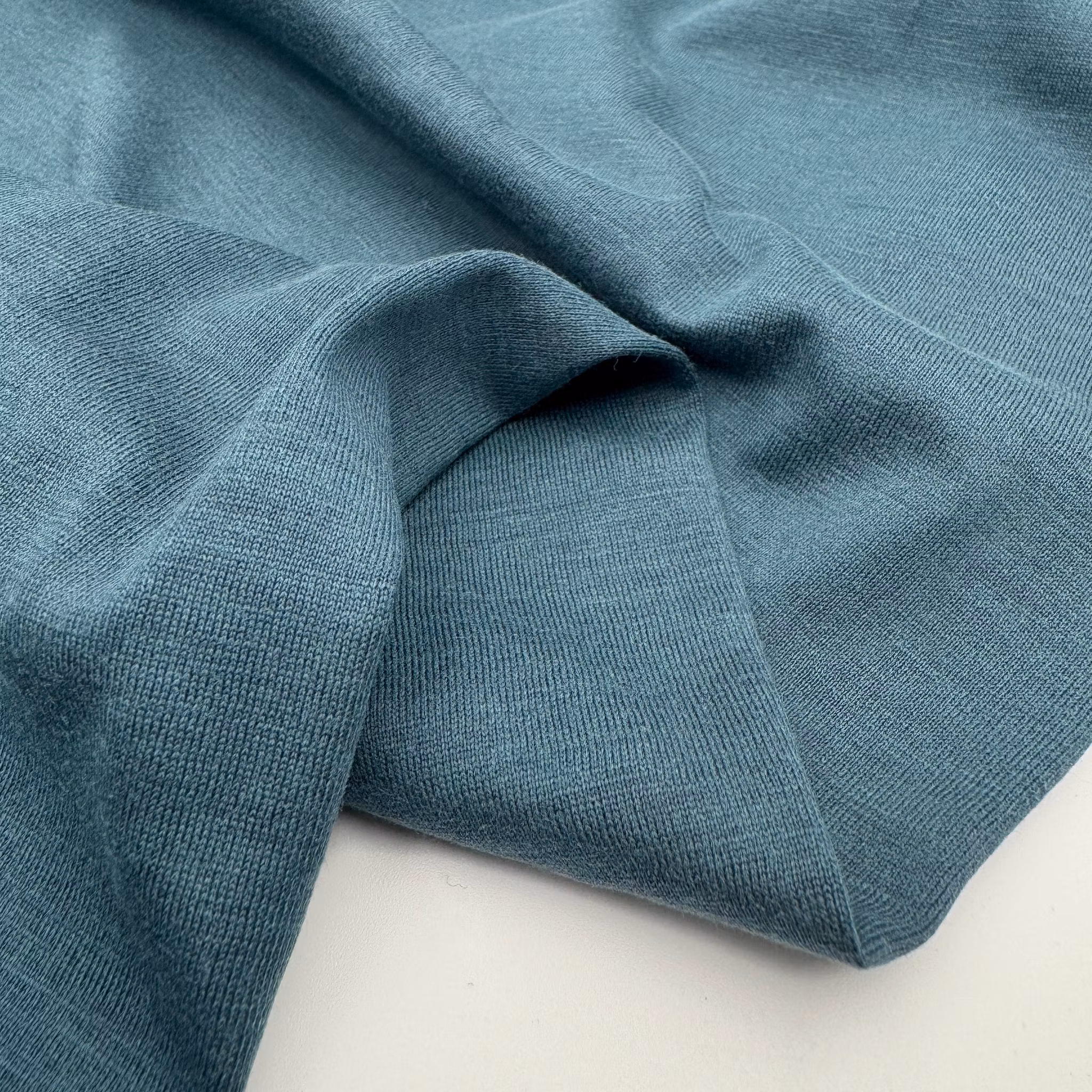 Bomull/sidentrikå petrol