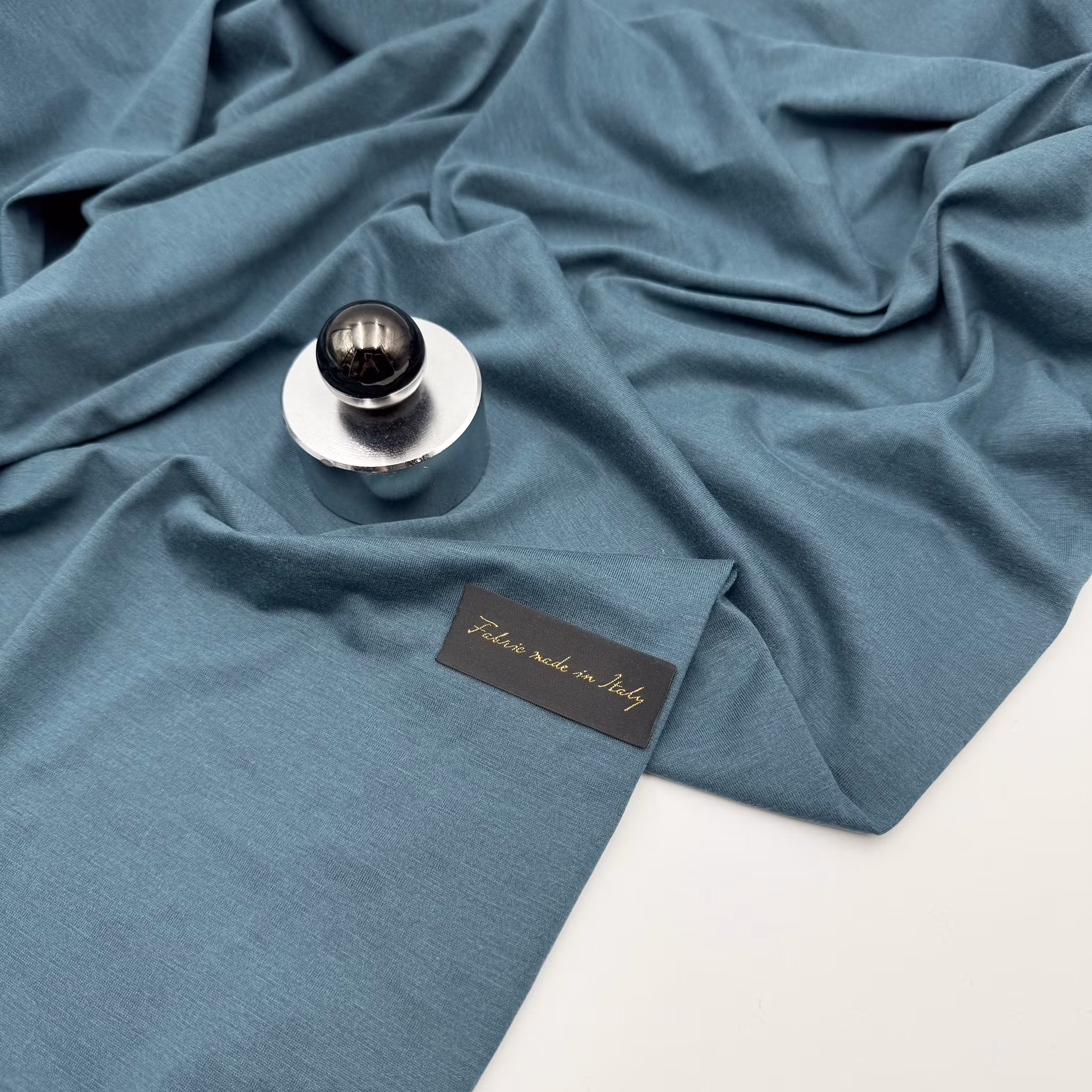 Bomull/sidentrikå petrol