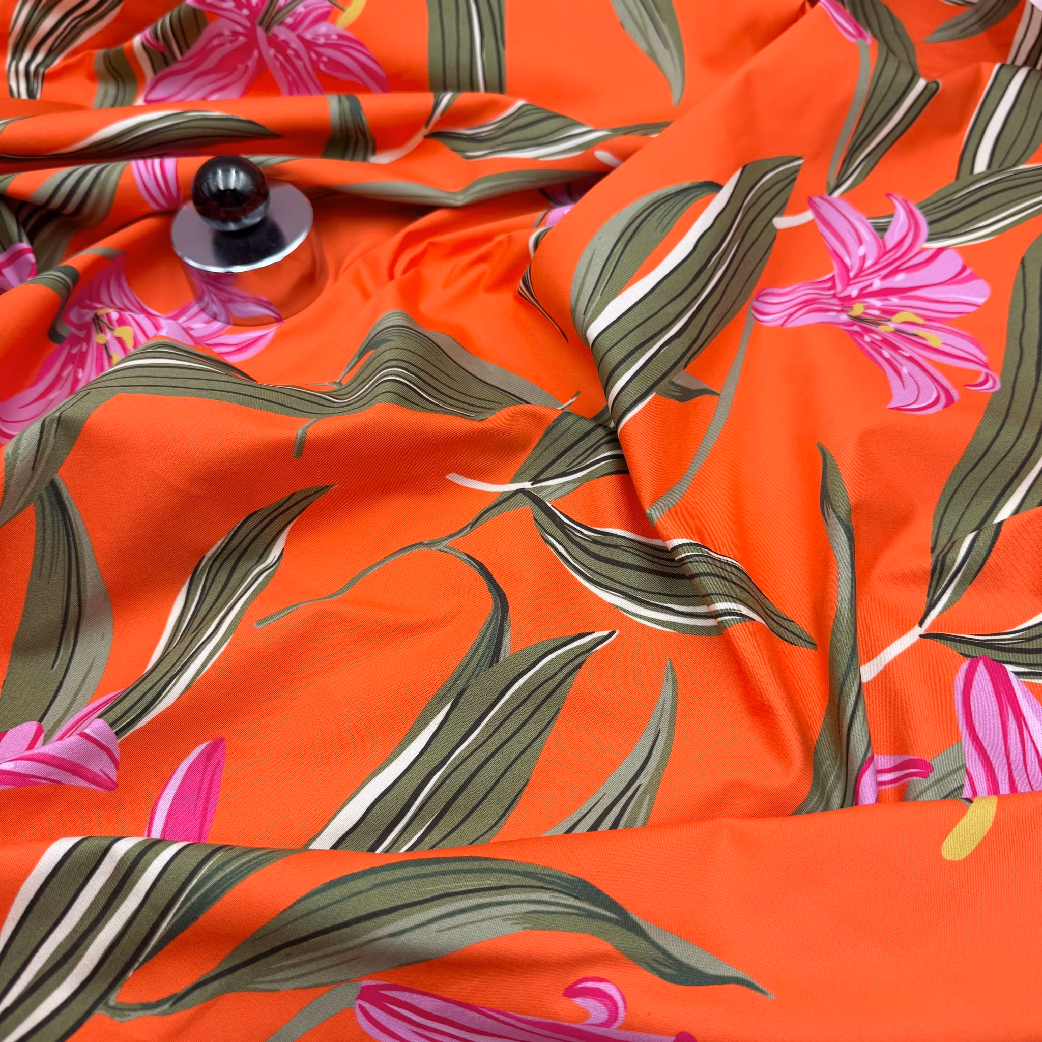 Bomull/elastan orange storblommig Hugo B***