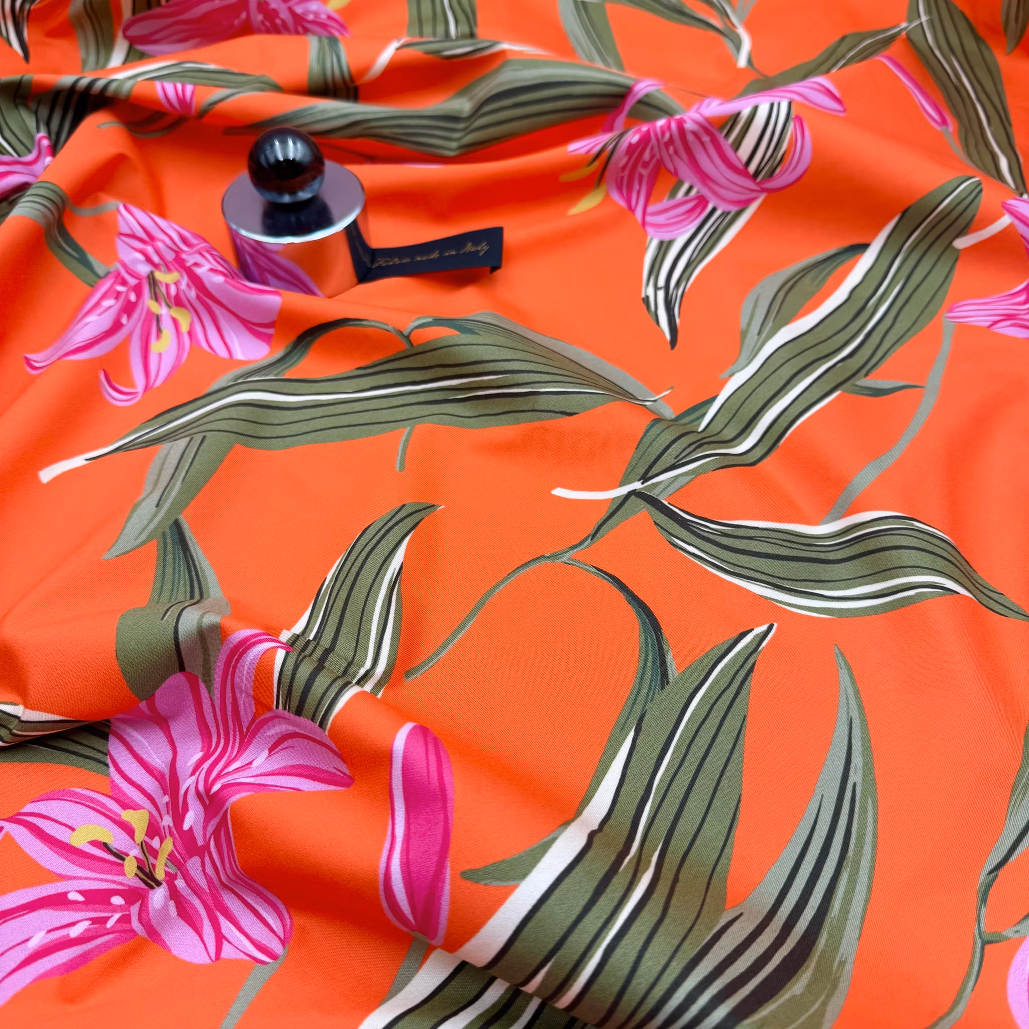 Bomull/elastan orange storblommig Hugo B***