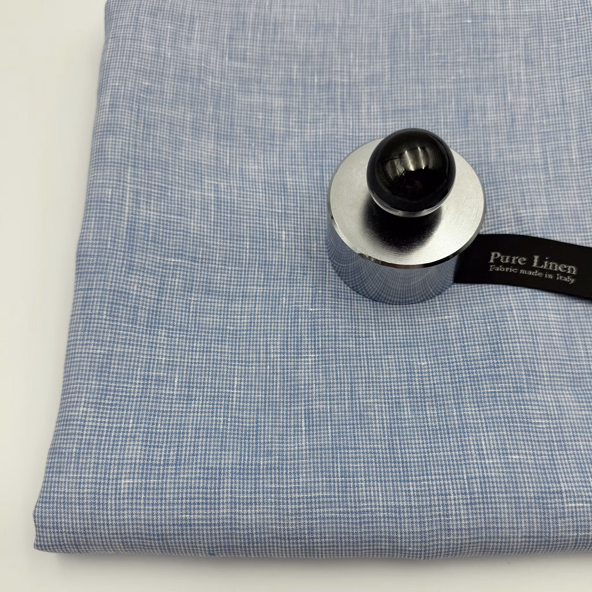 Lin ljusblå/vit minihundtand