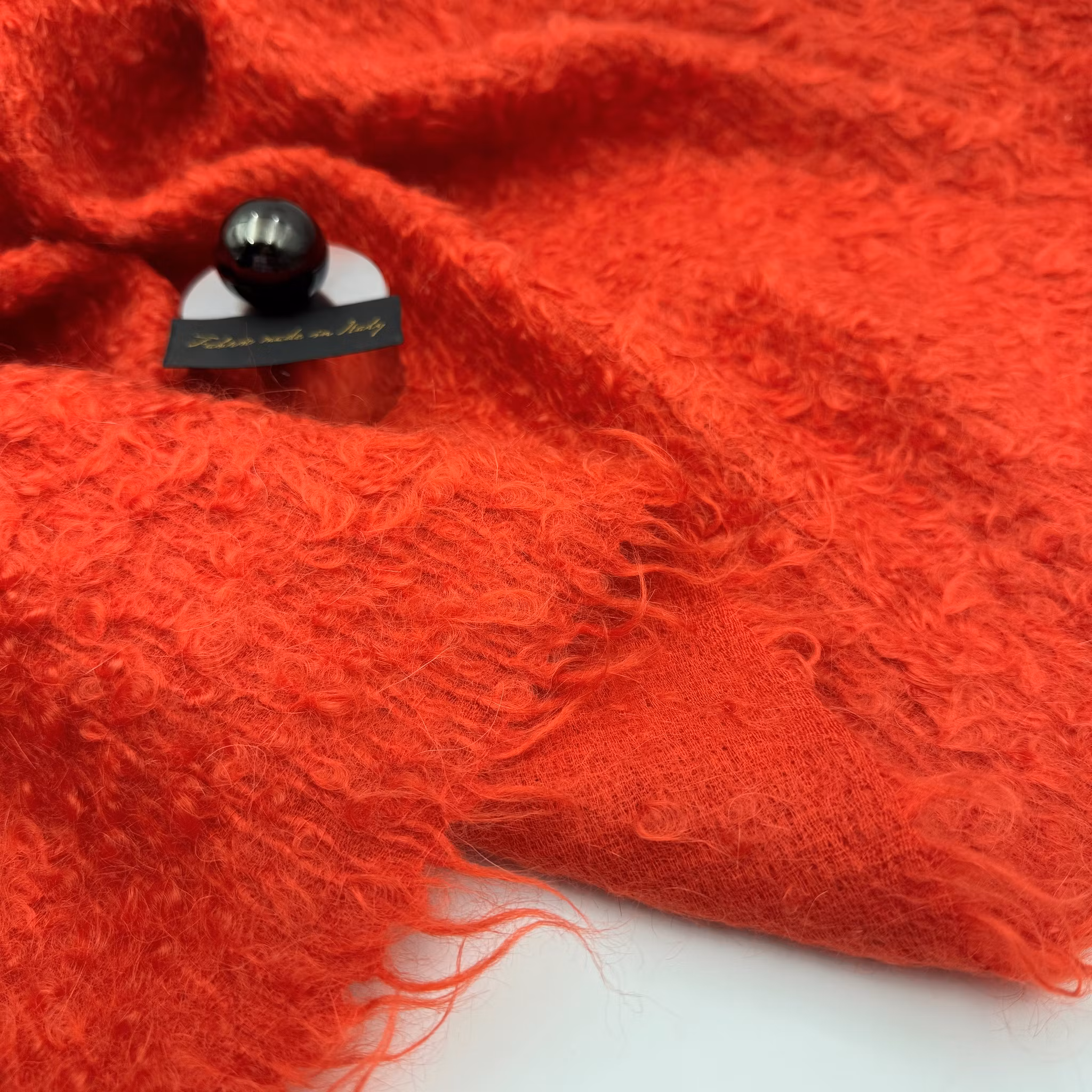Ull/mohair bouclé röd Westw**d