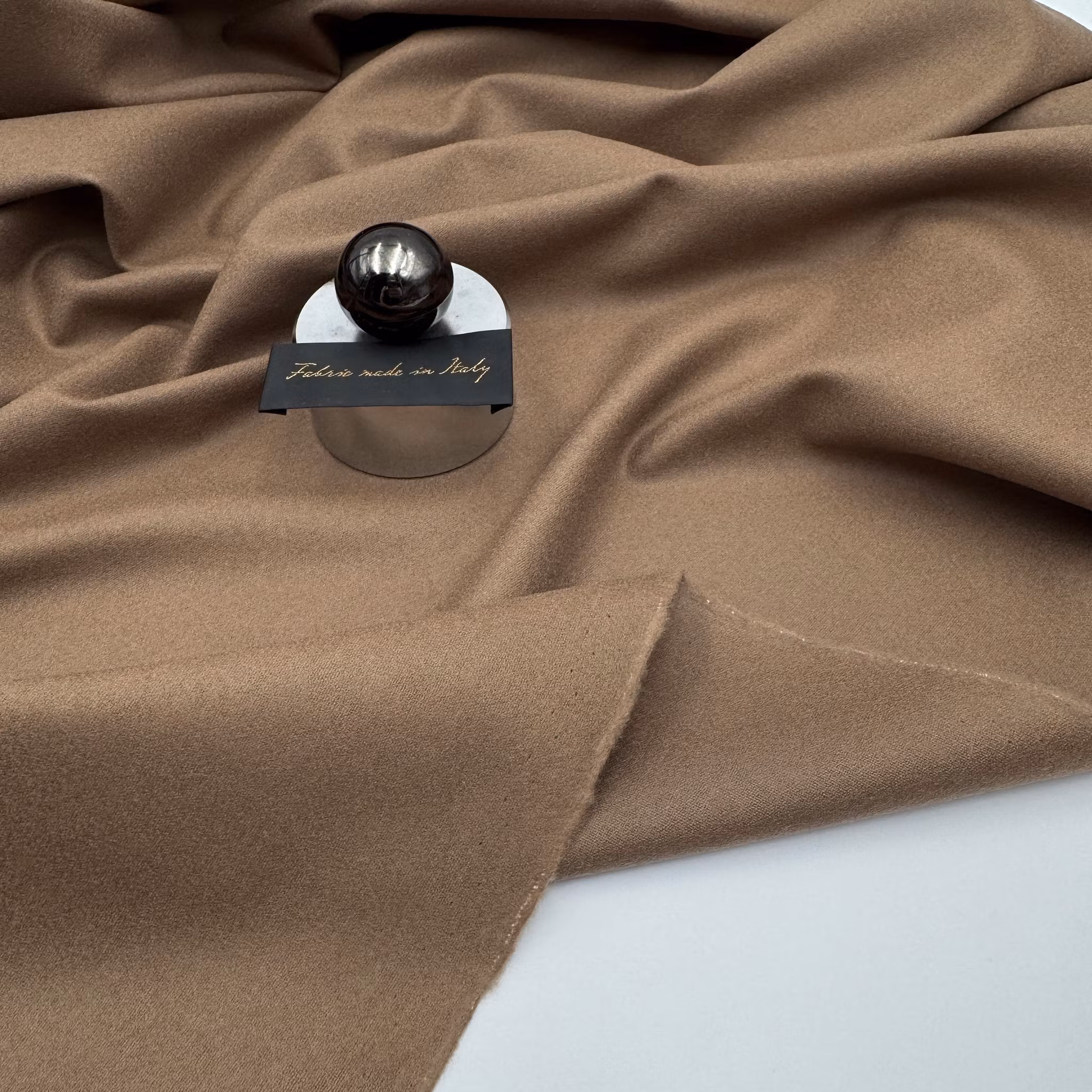 Ull/elastan borstad ljusbrun Riccer*