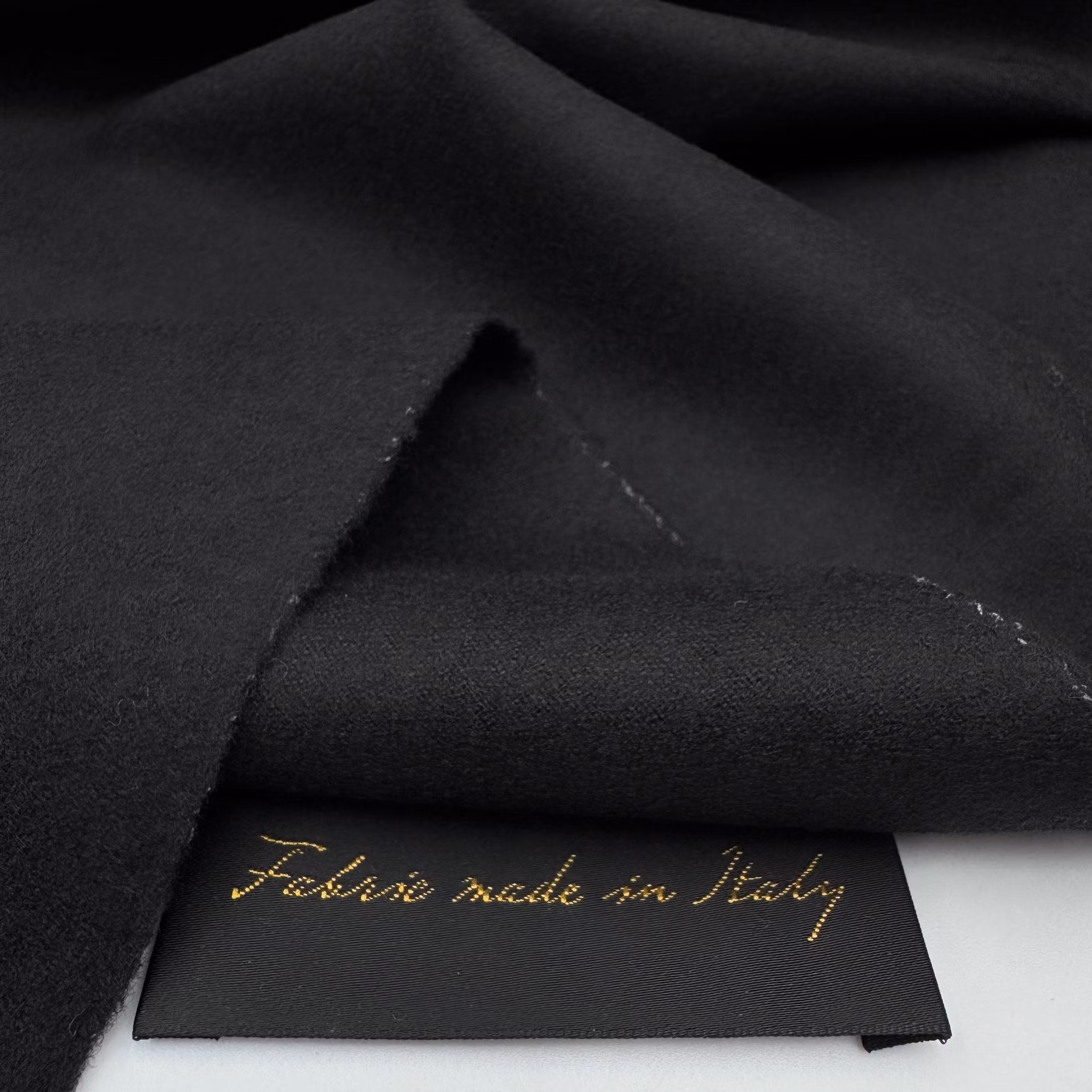 Ull/elastan borstad svart Riccer*