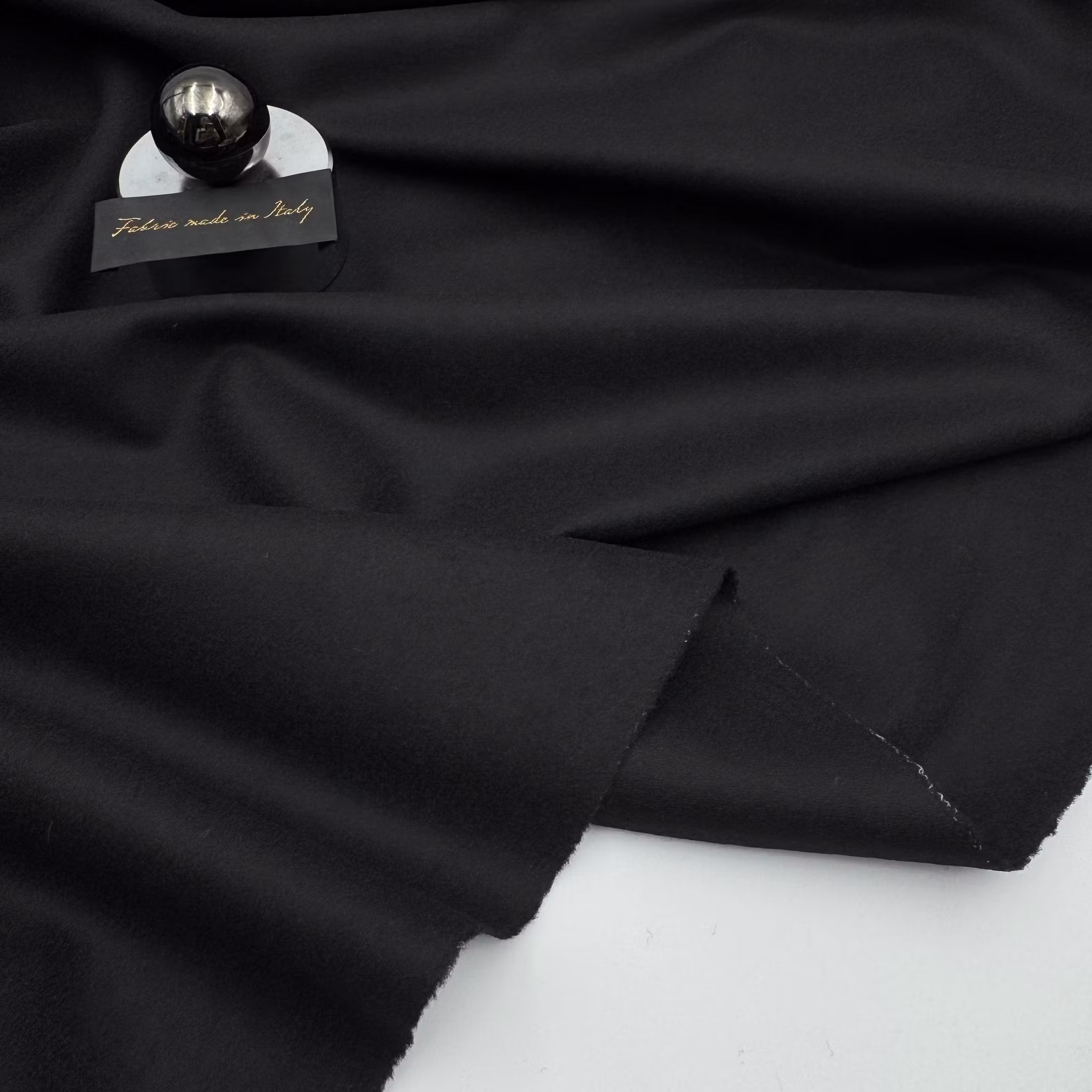 Ull/elastan borstad svart Riccer*