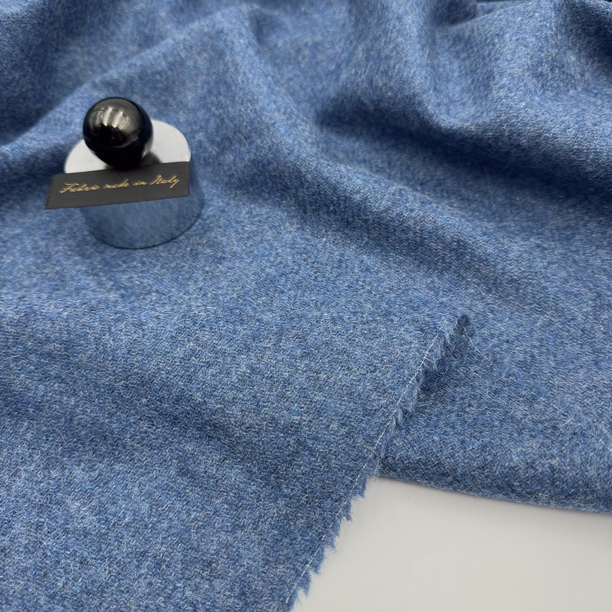 Ulltweed mellanblå