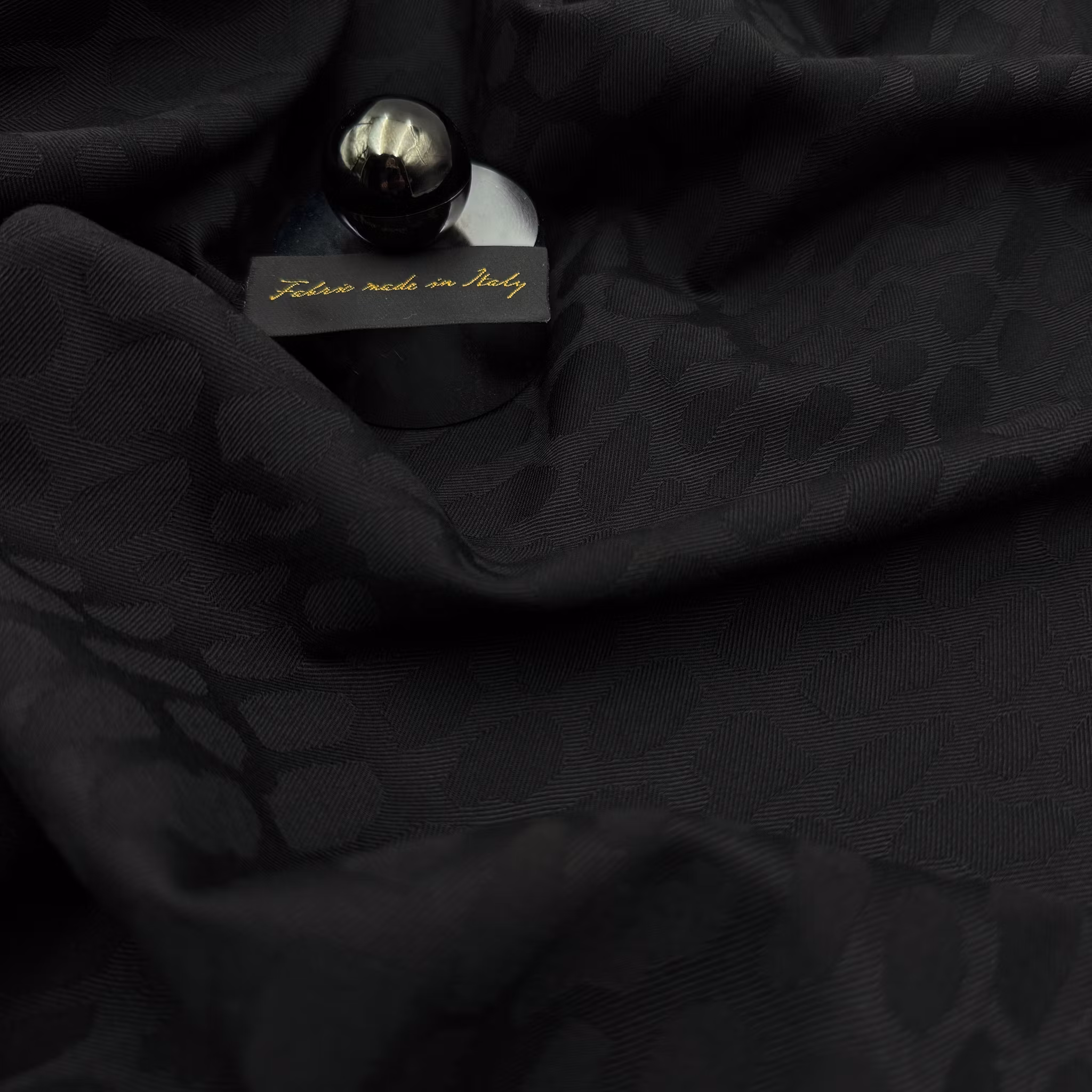 Ull/elastan jaquard svart