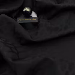 Ull/elastan jaquard svart