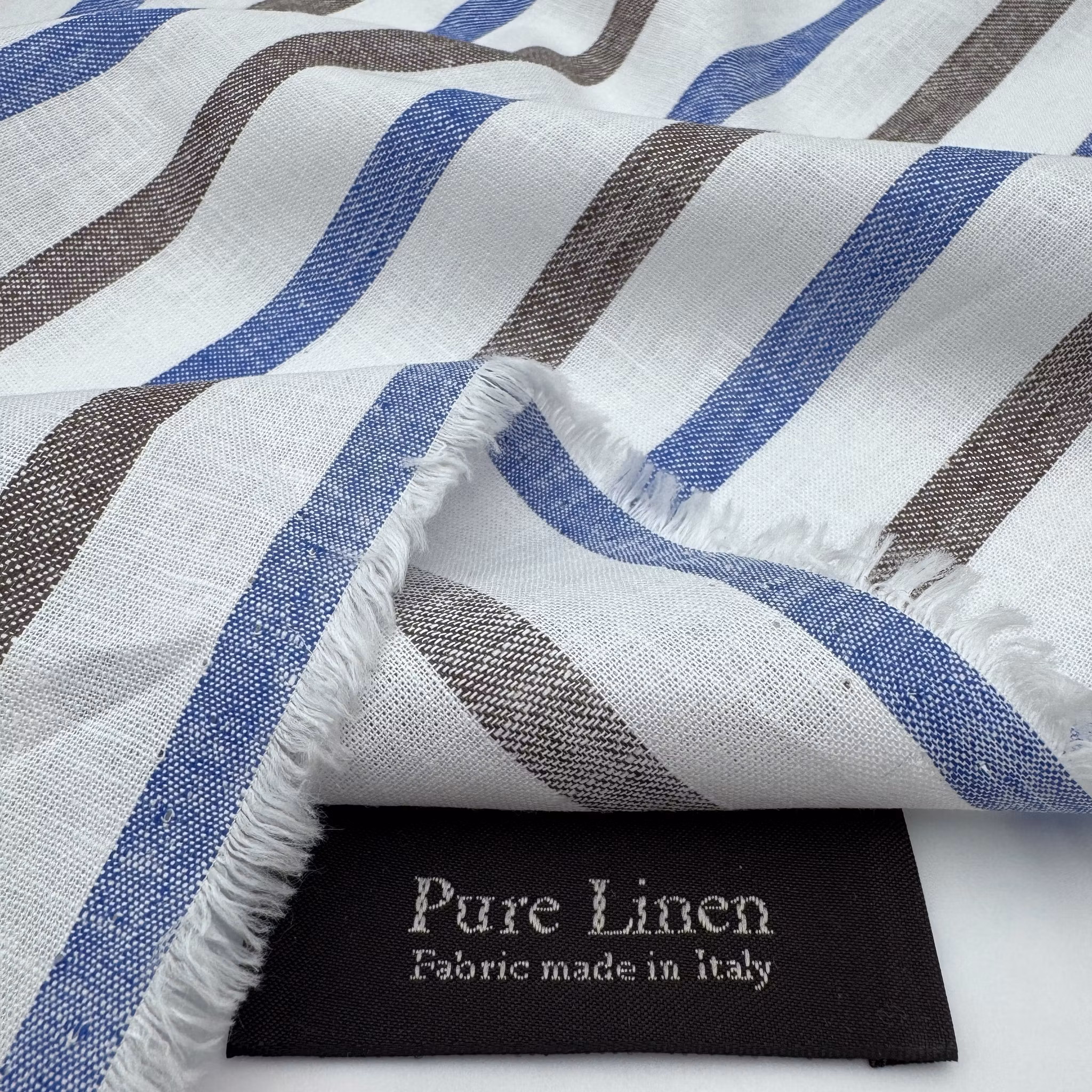 Lin vit/blå/brun rand