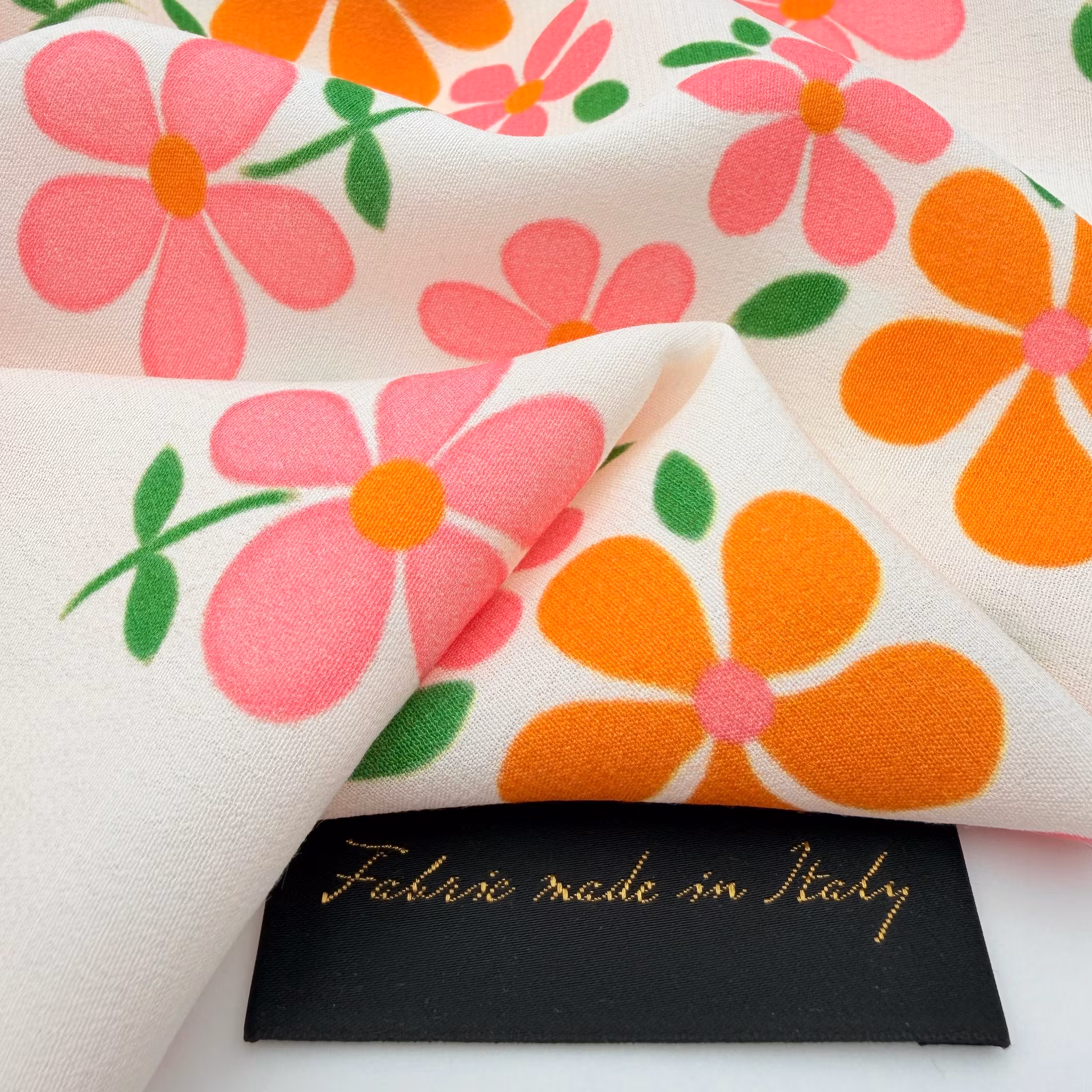 Viskoscrêpe rosa/orange blommig