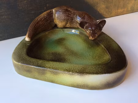 Fox on edge of bowl 96