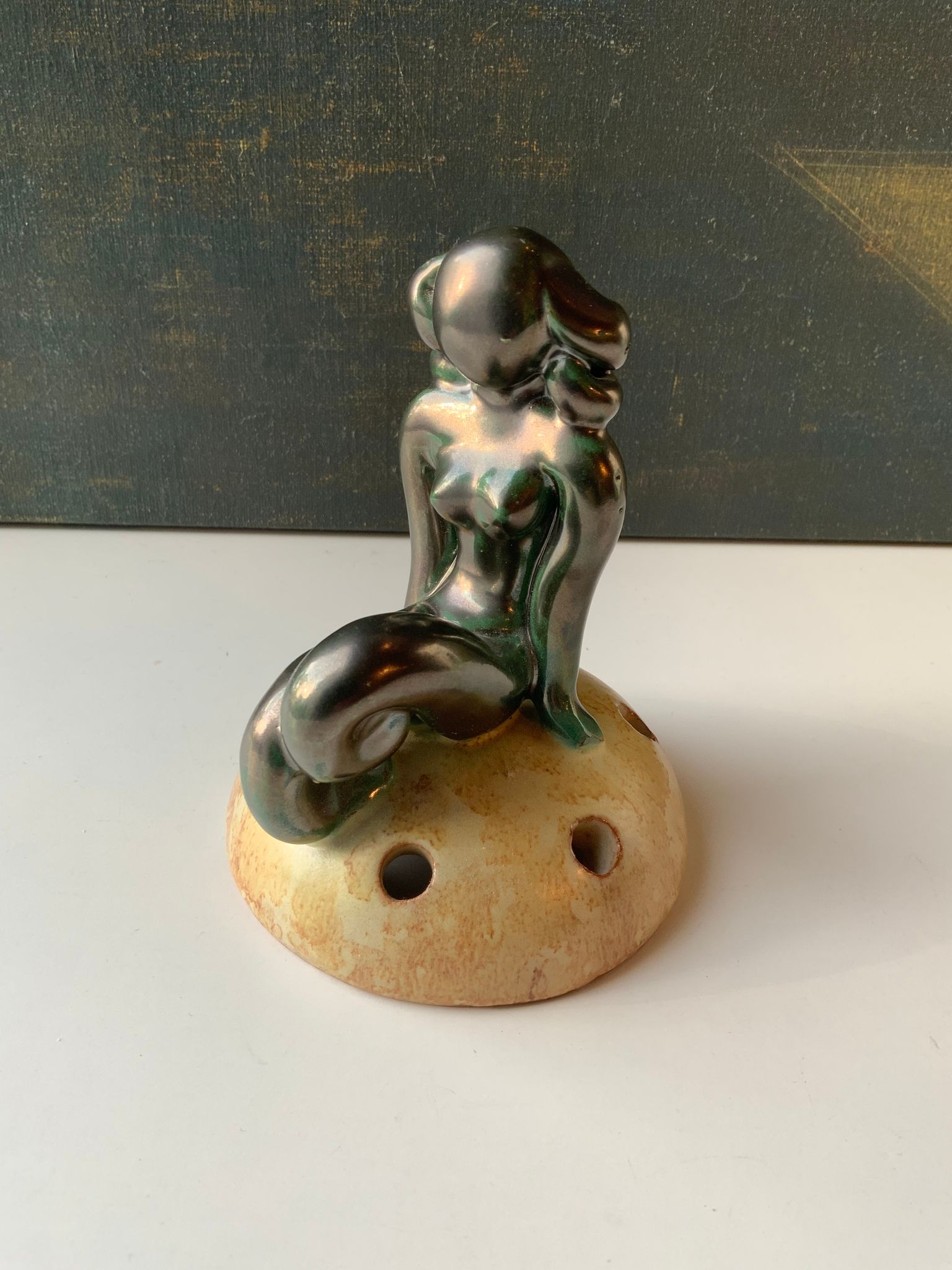 Green lady on yellowish flower holder 30