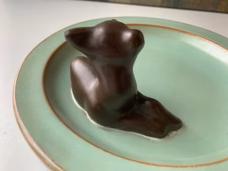 Brown deer in green ashtray 46