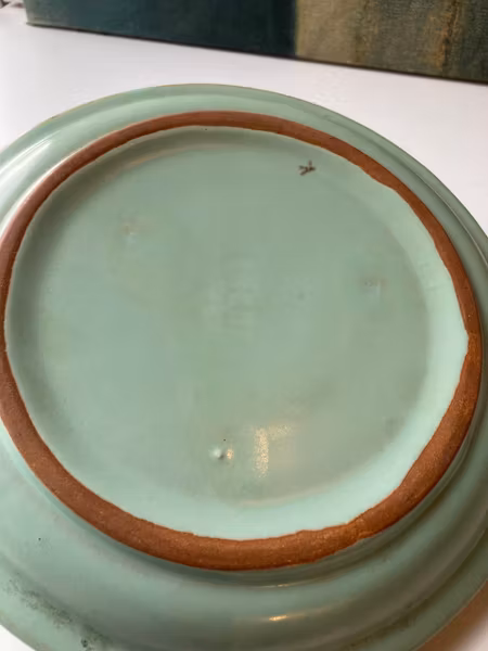 Brown deer in green ashtray 46