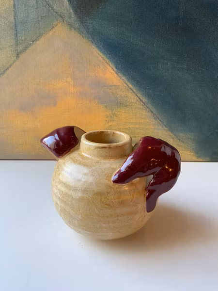 Yellowish/maroon vase 189