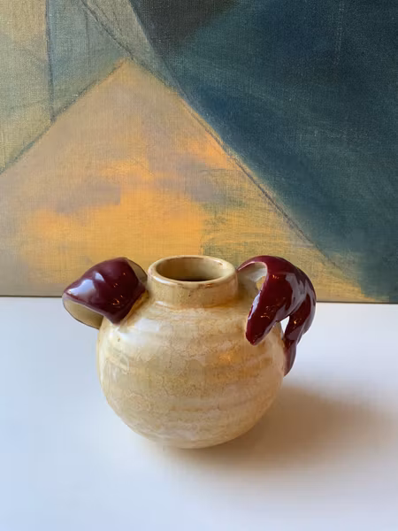 Yellowish/maroon vase 189