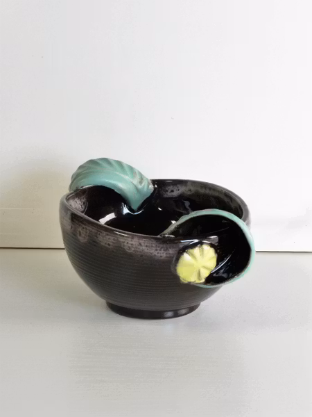 bowl 102 with green handles