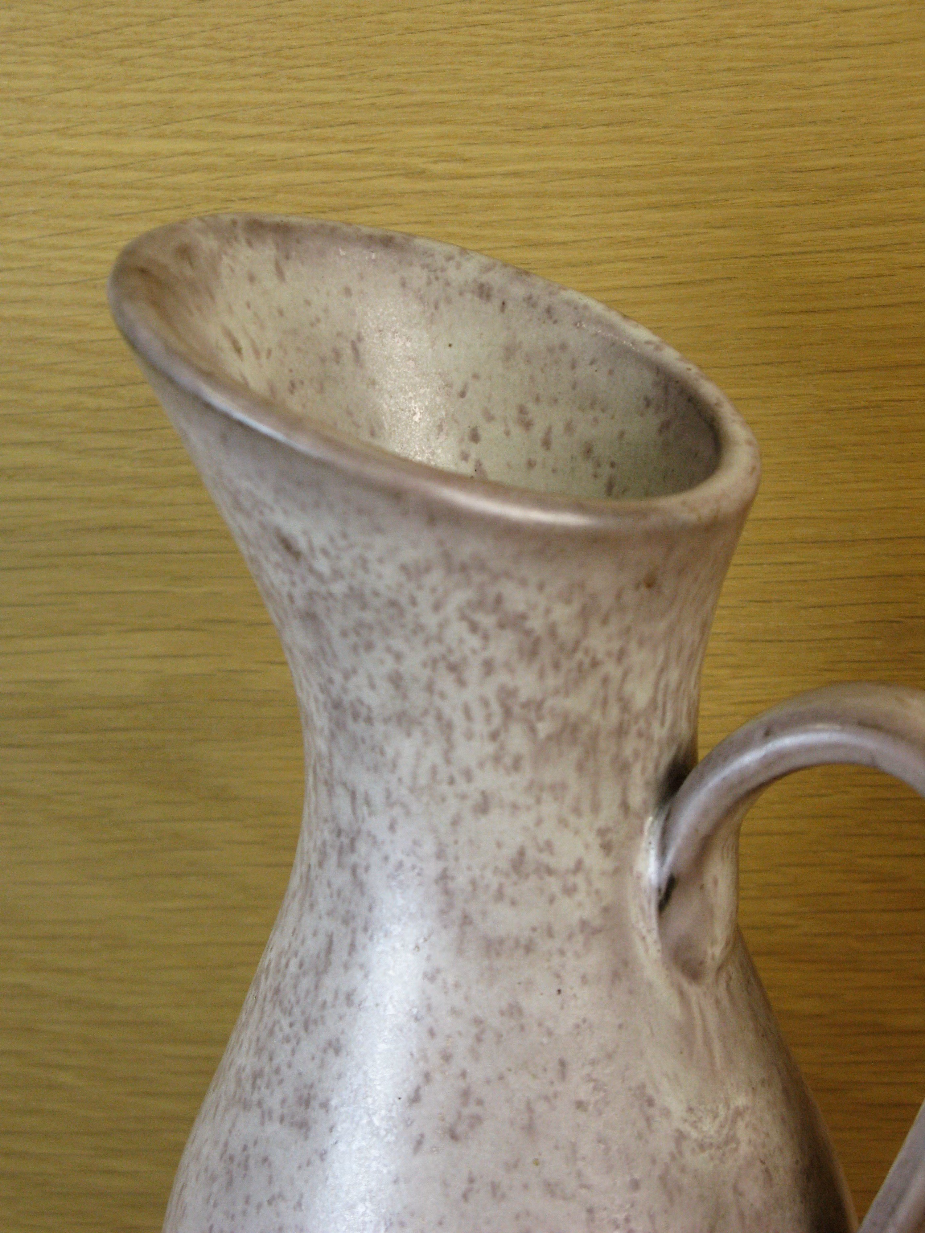grey pitcher 17