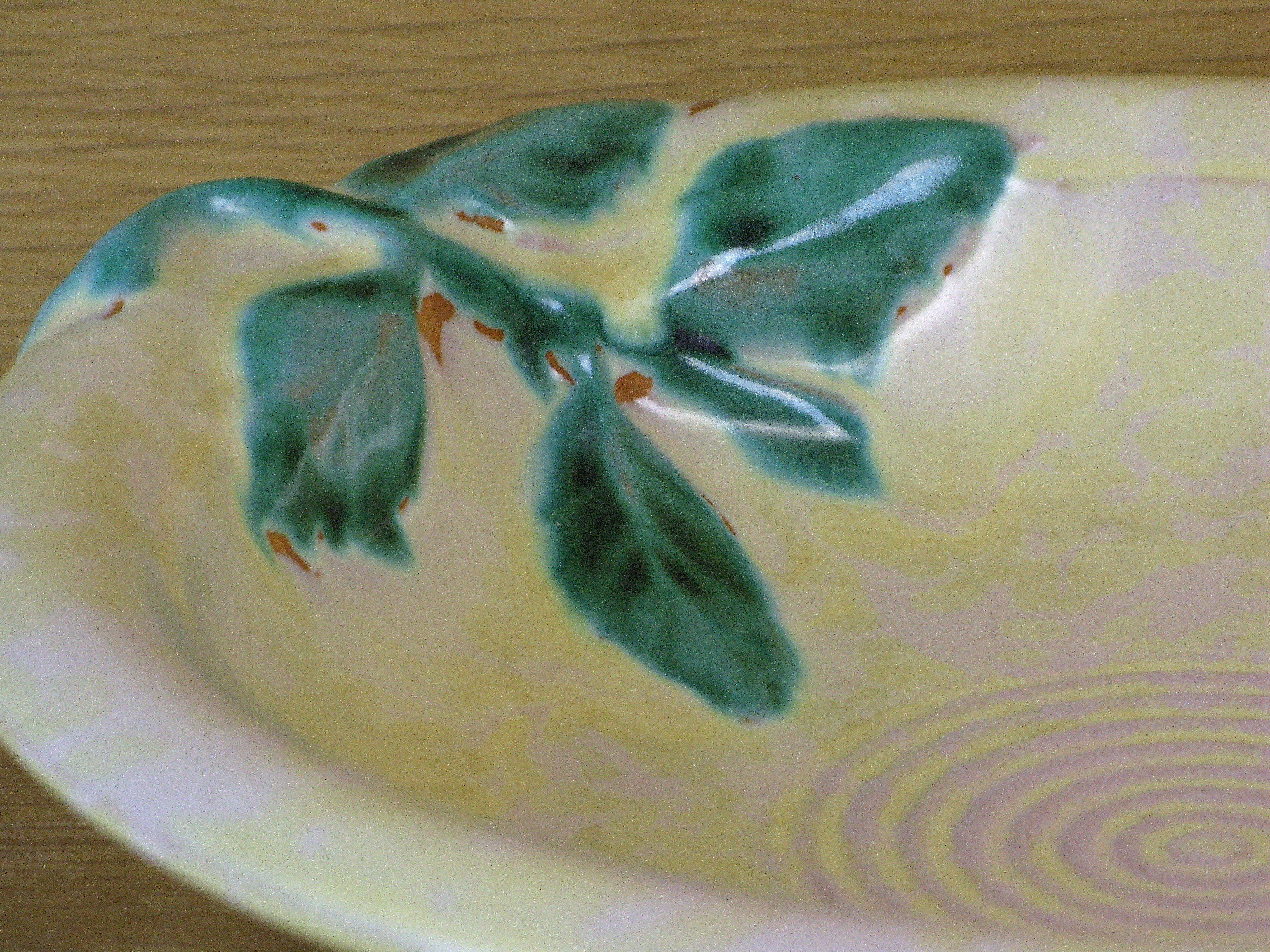 yellowish bowl 79 with green details