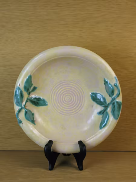 yellowish bowl 79 with green details