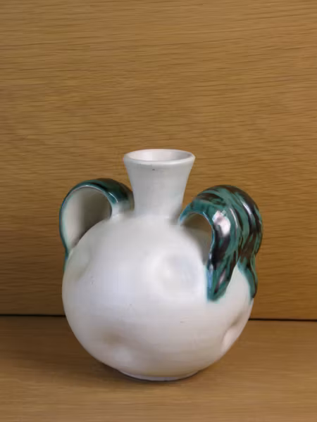 white vase with green handles 190