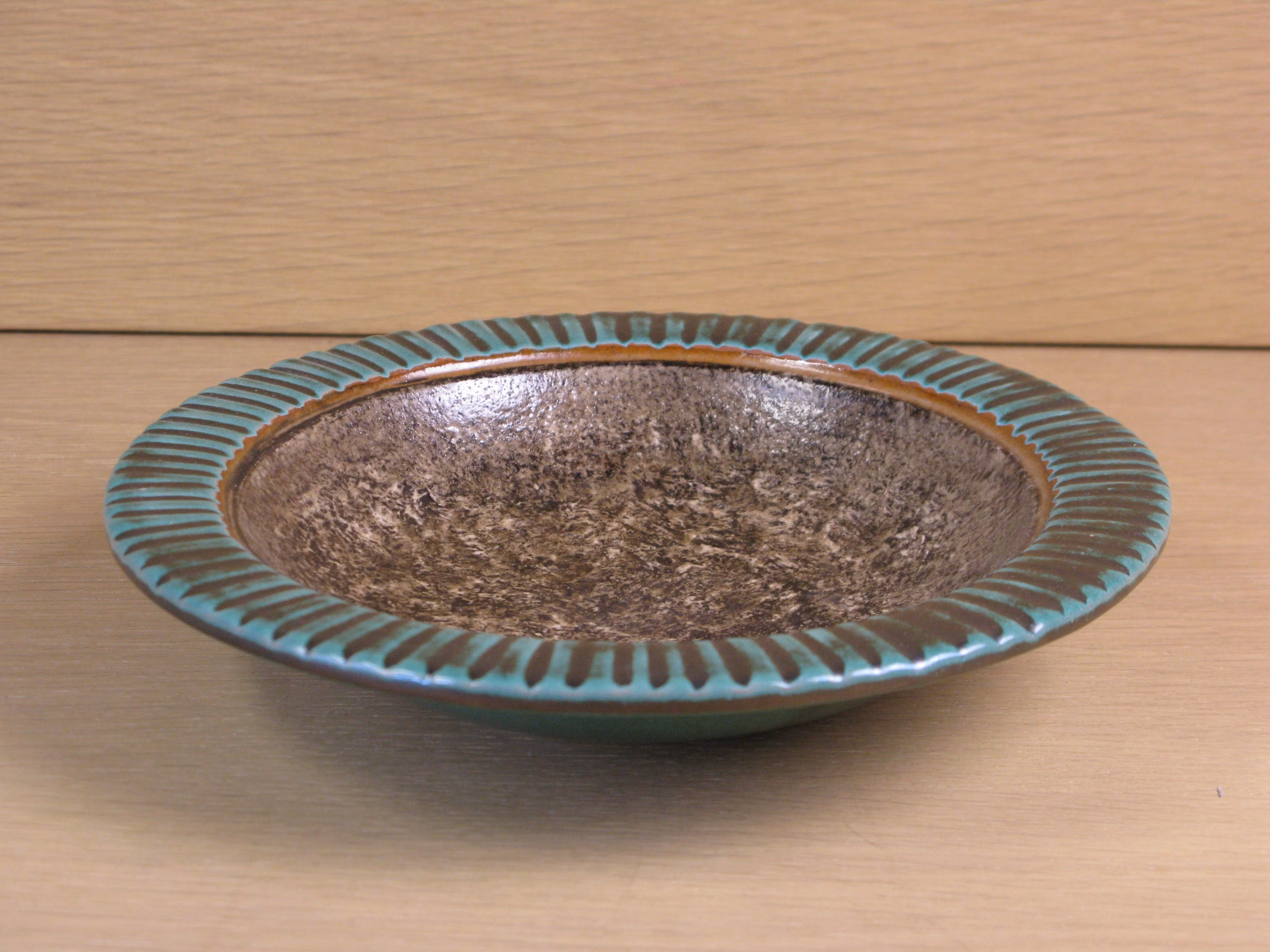 green and brown bowl