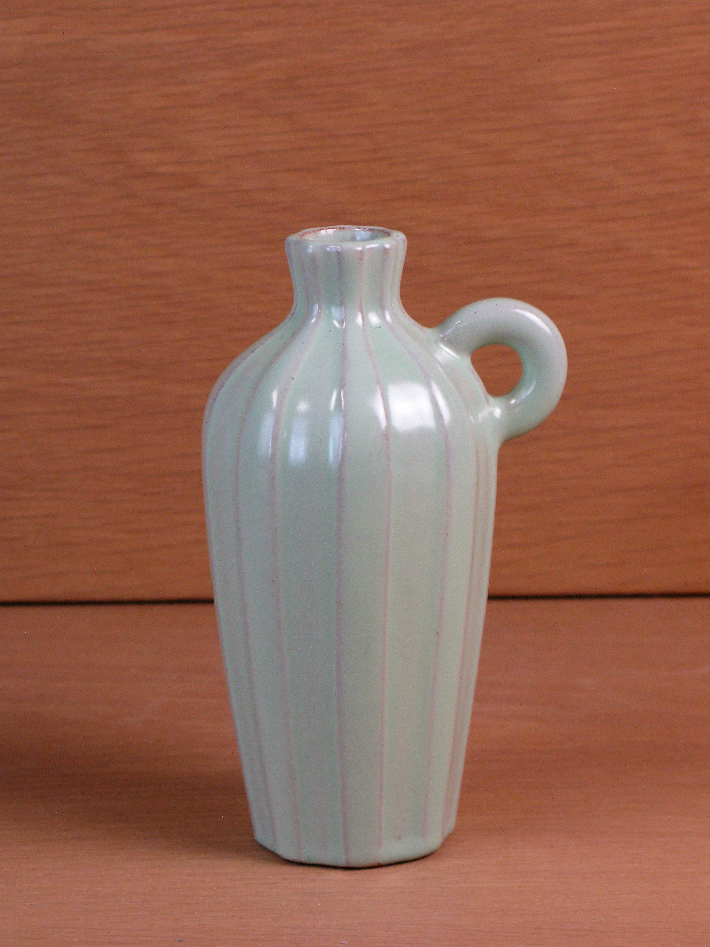 green pitcher 73