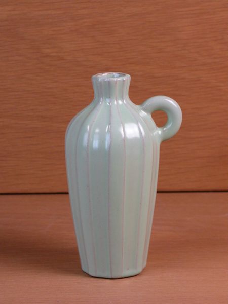 green pitcher 73
