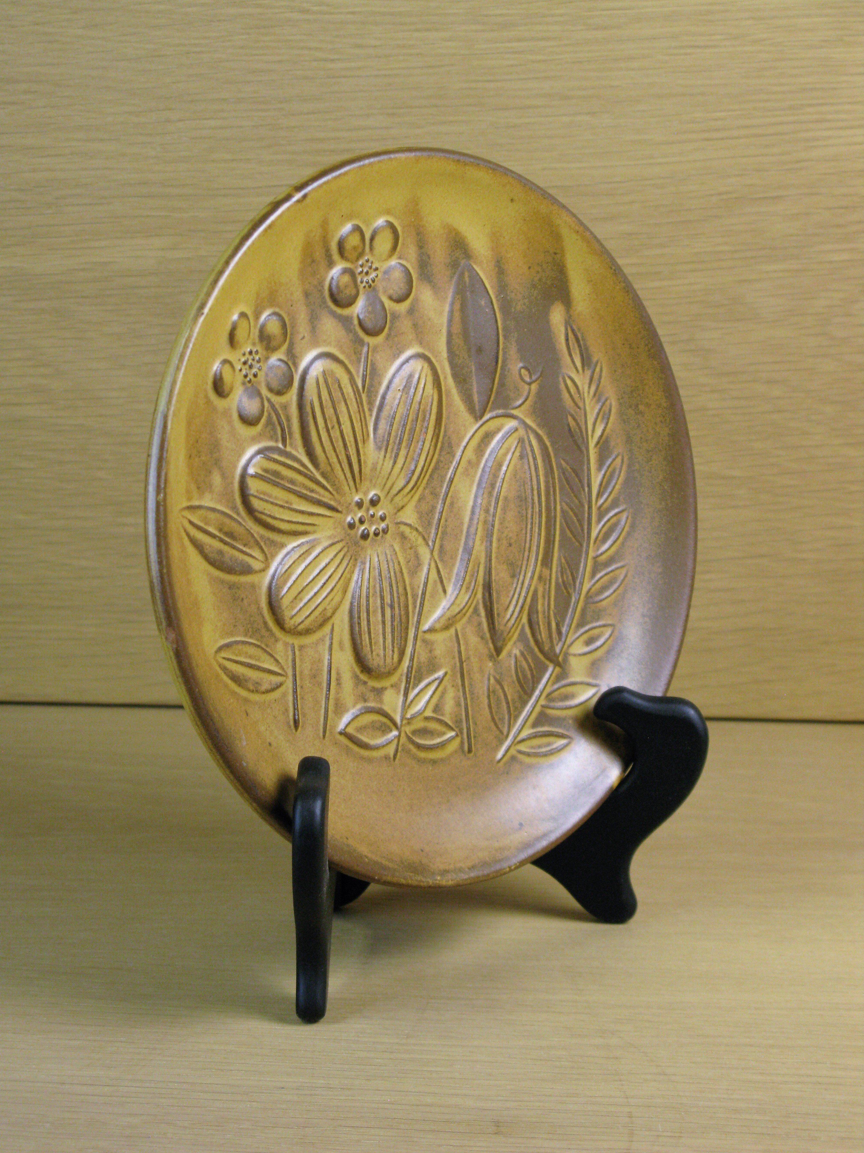 brownish small plate 18