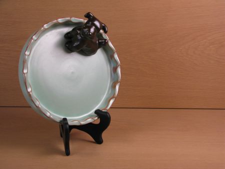 brown dog in green ashtray 12