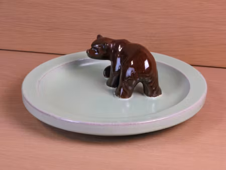 brown bear in green ashtray 46
